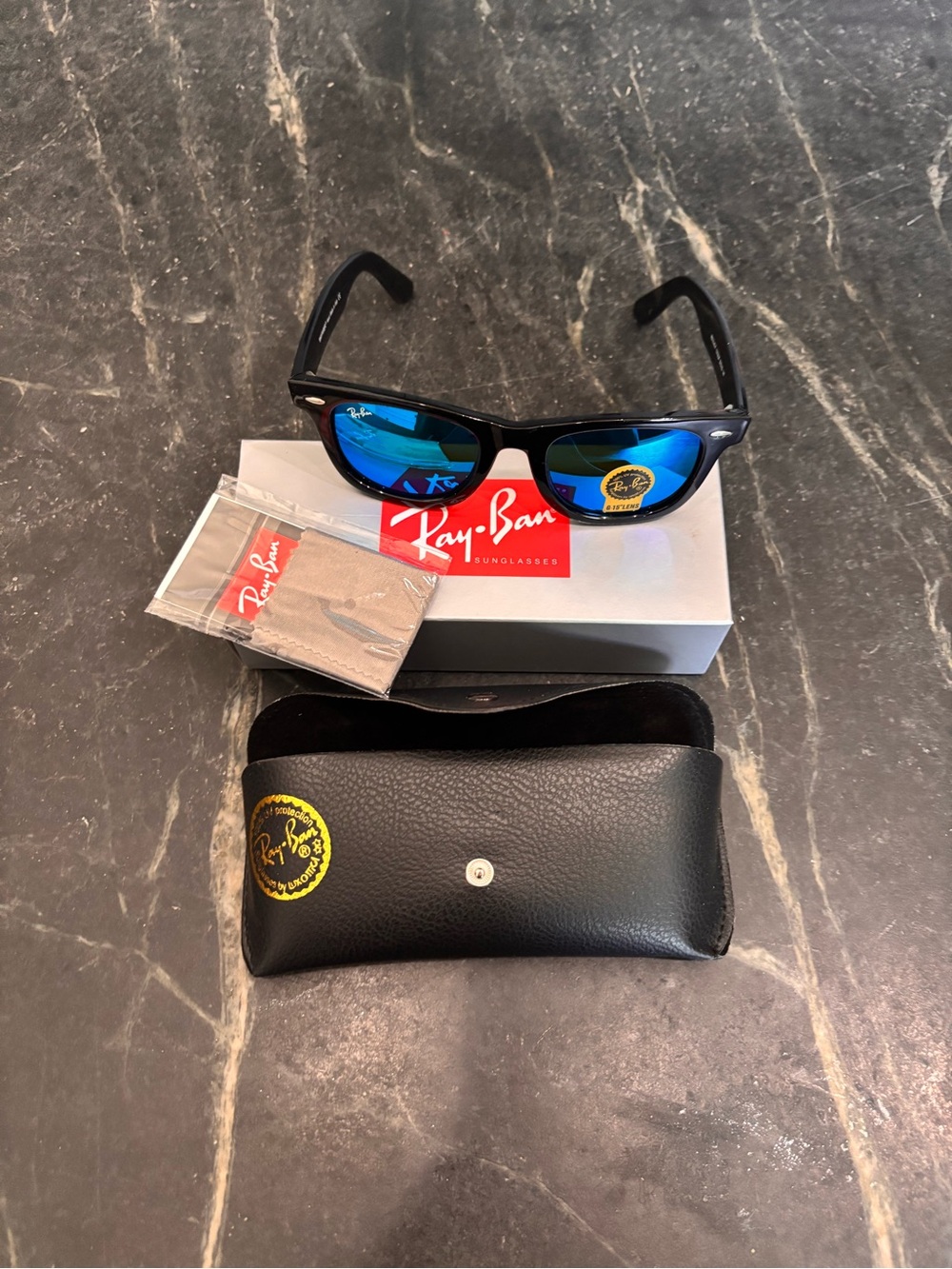 Ray-Ban Black Frame Sunglasses with Blue Mirror Lenses